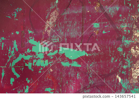 Burgundy and Turquoise Grunge Texture With Peeling Paint. Vintage texture of weathered burgundy metal, peeling turquoise paint, scratches, distressed surface. Natural background for urban design 143657541