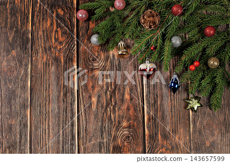Festive winter greeting card and banner on the screen, Beautiful Christmas and New Year background with lights, decorations, toys and live fir branches, product design for holiday advertising, Festive winter greeting card and banner on the screen, Beautiful Christmas and New Year background with lights, decorations, toys and live fir branches, product design for holiday advertising, 143657599