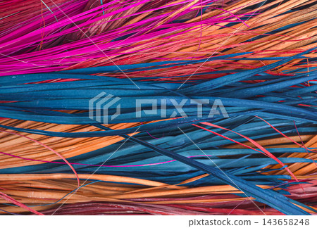 Abstract Background of Colorful Dyed Natural Palm Leaf Fibers Abstract Background of Colorful Dyed Natural Palm Leaf Fibers 143658248