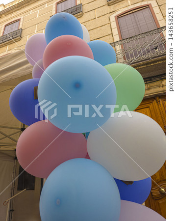 Bunch of Colorful Pastel Balloons Floating Outdoors During Celeb Bunch of Colorful Pastel Balloons Floating Outdoors During Celeb 143658251