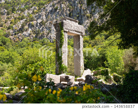 Ruins of Temple of Hadrian in Termessos at foot of Gulluk Mountain, Turkey Ruins of Temple of Hadrian in Termessos at foot of Gulluk Mountain, Turkey 143658837