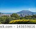 A view of Sakurajima and Kinko Bay from the Nagashima Art Museum in summer, with the city of Kagoshima stretching out to the distant mountains. 143659816
