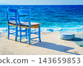 Two blue chairs by the sea in Mochlos, Crete, Greece 143659853