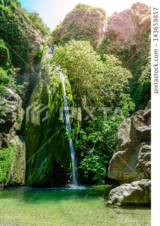 Richtis Gorge waterfall with lush vegetation, Crete, Greece Richtis Gorge waterfall with lush vegetation, Crete, Greece 143659857