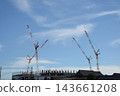A large crane above a construction site 143661208