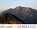 Mount Goryu bathed in the morning sun, a view from Karamatsu Mountain Hut 143661213