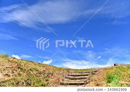 The stairs leading to the 48 rice paddies and the refreshing autumn blue sky. The stairs leading to the 48 rice paddies and the refreshing autumn blue sky. 143661906