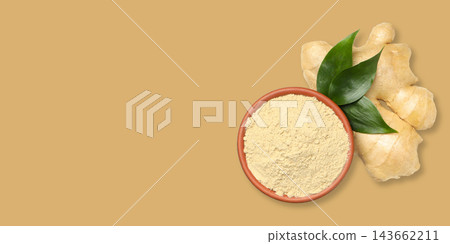 Ginger root and ginger powder are presented beautifully on a neutral background Ginger root and ginger powder are presented beautifully on a neutral background 143662211