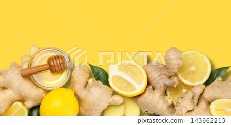 Ginger root, lemon slices, and honey arranged artistically on a bright background Ginger root, lemon slices, and honey arranged artistically on a bright background 143662213