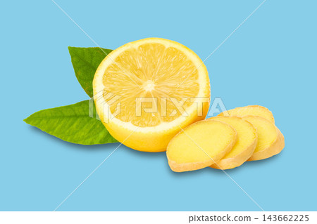 Fresh ginger root and lemon slices presented with green leaves for nutritional drinks 143662225