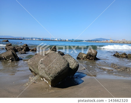 A coastal landscape woven from the blue sea and giant concrete blocks. A coastal landscape woven from the blue sea and giant concrete blocks. 143662320