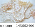 Pearl accessories and beautiful lace 143662400