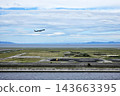 Airplane Taking Off over Runway and Sea at Kansai International Airport in Osaka, Japan. 143663395