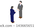 A businessman in a suit exchanging business cards. 143665651