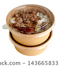 Two stacked kraft paper bowls with clear plastic lids containing grilled meat over white rice. Sustainable food packaging for takeaway or delivery isolated. 143665833