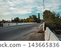 Rural Road with White Bridge Railings 143665836