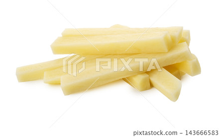 Cut raw potatoes into long strips for making French fries isolated on a white background Cut raw potatoes into long strips for making French fries isolated on a white background 143666583