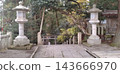 The stone lanterns and tree-lined approach to Hakusan Hime Shrine 143666970