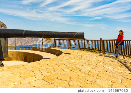 Tourist woman at Battery de Castillitos in Spain Tourist woman at Battery de Castillitos in Spain 143667080