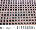 Design of a wall surface with perforated blocks arranged in a grid pattern 143668391