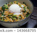 Homemade bibimbap topped with a soft-boiled egg 143668705