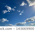 Blue sky with clouds and sunshine 143669900