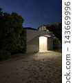 Toilet in a park at night - safe and reassuring - glad to have it. 143669996