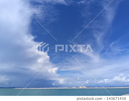 Malaysia, Penang, the blue sea of the Andaman Sea, blue sky, and white clouds. Malaysia, Penang, the blue sea of the Andaman Sea, blue sky, and white clouds. 143671438