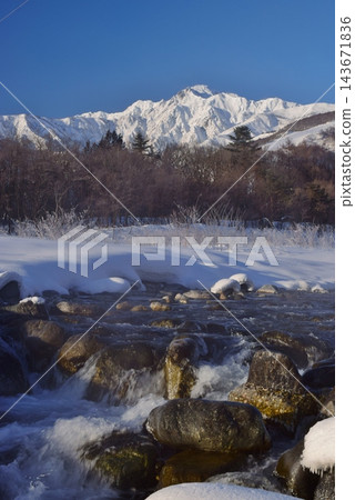 Mount Goryu in winter, as seen from Hakuba Village Mount Goryu in winter, as seen from Hakuba Village 143671836