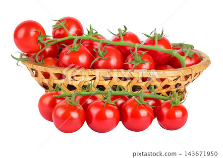 Cherry tomato bunch in a wicker basket isolated on white background Cherry tomato bunch in a wicker basket isolated on white background 143671950