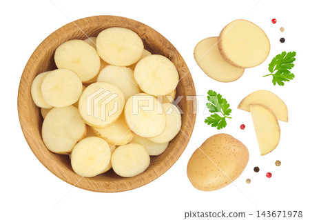 young potato slices in wooden bowl isolated on white background. Harvest new. Top view. Flat lay. 143671978