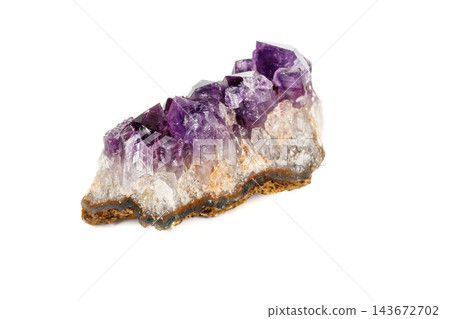 Amethyst Crystal Druse macro mineral on white background Amethyst Crystal Druse macro mineral on white background 143672702