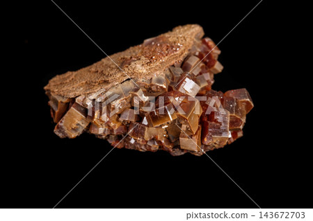 Macro mineral stone Vanadinite on a black background Macro mineral stone Vanadinite on a black background 143672703
