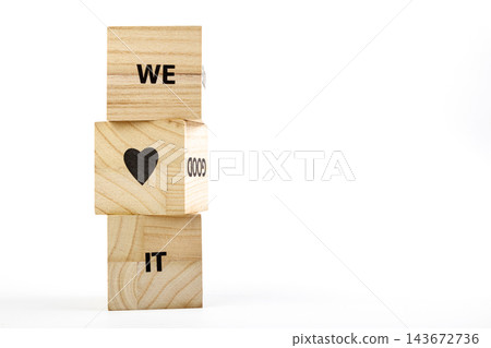 Wooden cubes with the inscription me love it on a white background Wooden cubes with the inscription me love it on a white background 143672736