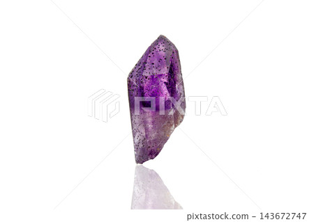 macro mineral stone amethyst on a white background 143672747