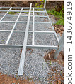 Steel Frame Base Structure Under Construction on Gravel Ground 143674919