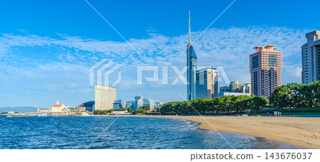 Fukuoka Tower and the cityscape of Momochihama as seen from Seaside Momochi Beach Park in Fukuoka. Fukuoka Tower and the cityscape of Momochihama as seen from Seaside Momochi Beach Park in Fukuoka. 143676037