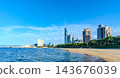 A view of Fukuoka: Fukuoka Tower soaring against the blue sky and Seaside Momochi Beach. 143676039