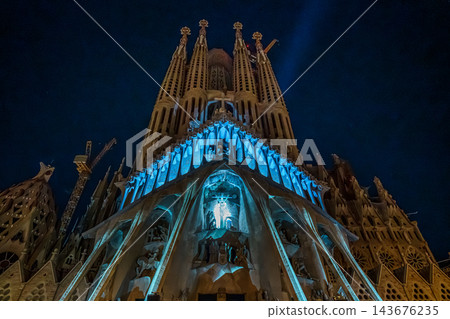 Sagrada Familia Passion facade and four spires at blue hour in Barcelona Sagrada Familia Passion facade and four spires at blue hour in Barcelona 143676235