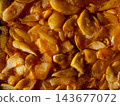 Autumn Apple Jam Texture with Slices in Warm Golden Sunlight 143677072