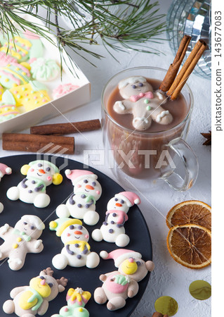 Christmas marshmallows. Winter candy. Sweet food in december. Snowman and Santa Claus. 143677083