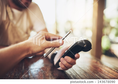 Hand, smartphone and pos terminal in coffee shop for payment by customer for waitress service. Finance, bill and nfc with person paying paperless using wireless technology in cafe or restaurant Hand, smartphone and pos terminal in coffee shop for payment by customer for waitress service. Finance, bill and nfc with person paying paperless using wireless technology in cafe or restaurant 143678090