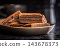 Stacked Chocolate Brownies On Plate Close-Up Rustic Dessert With Rich Fudge Layers 143678373