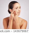 Woman, portrait and squeeze pimple for acne problem with skincare check and skin health crisis in studio. Female person, breakout scar and face inspection with zit pop for beauty by white background 143679067