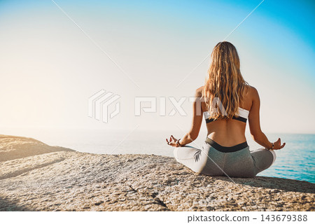 Beach, back and woman with meditation for yoga, wellness and spiritual peace in California. Zen, female yogi and hands with lotus pose for chakra, relax and mental health by mockup space outdoor Beach, back and woman with meditation for yoga, wellness and spiritual peace in California. Zen, female yogi and hands with lotus pose for chakra, relax and mental health by mockup space outdoor 143679388