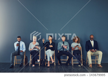 Business people, hiring and waiting in line with technology for recruitment process and employment opportunity. Diverse group, job seeker and sitting in row for HR meeting with mockup space or banner Business people, hiring and waiting in line with technology for recruitment process and employment opportunity. Diverse group, job seeker and sitting in row for HR meeting with mockup space or banner 143679995