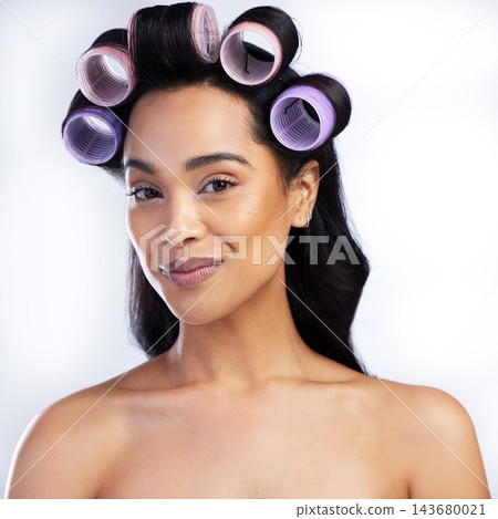 Beauty portrait, woman and rollers in hair for curly style with salon aesthetic and texture maintenance in studio. Model smile, female person and curlers for hairstyle results by white background Beauty portrait, woman and rollers in hair for curly style with salon aesthetic and texture maintenance in studio. Model smile, female person and curlers for hairstyle results by white background 143680021