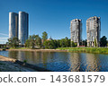 Modern Zunda Towers skyscrapers and Philosophers Residence buildings from the riverbank in Riga, Latvia. 143681579
