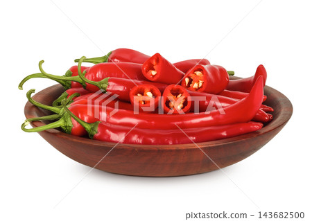 red hot chili pepper in wooden bowl isolated on white background red hot chili pepper in wooden bowl isolated on white background 143682500