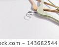 Hanger Hooks Detail on Light Background Abstract Concept 143682544